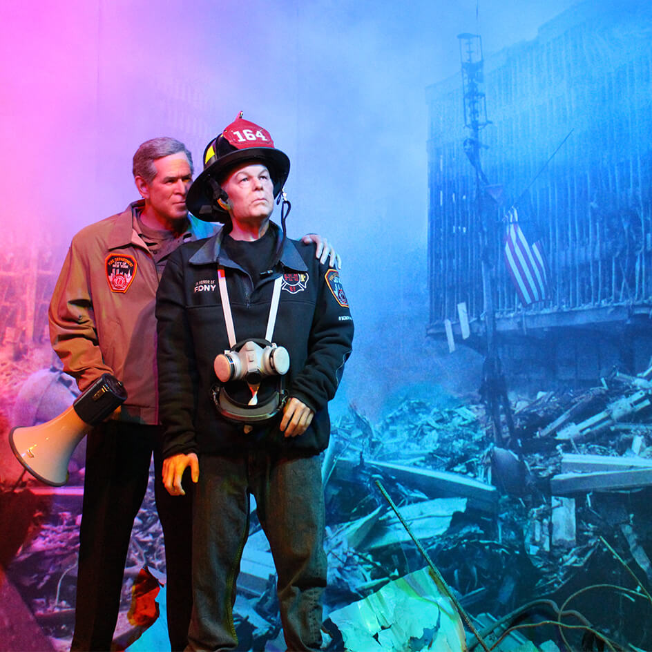George W. Bush and First Responder at 9-11 site.