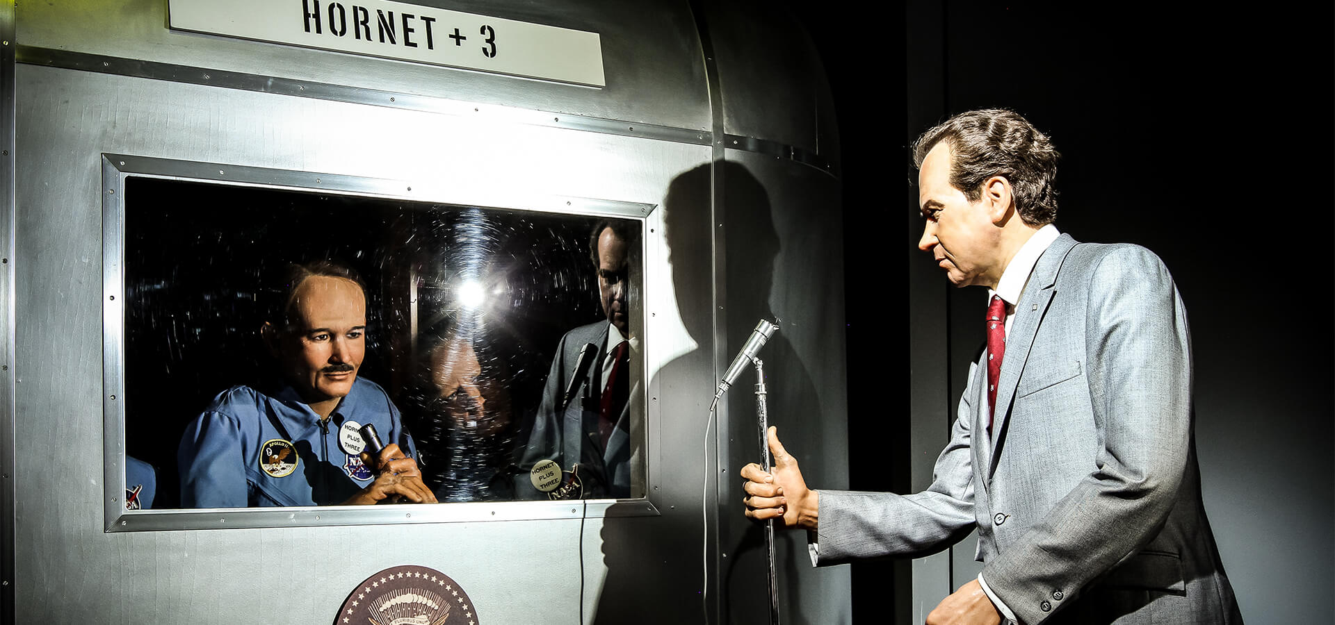 Photo of the Richard Nixon exhibit, depicting President Richard Nixon welcoming the Apollo XI Astronauts after their return to earth.